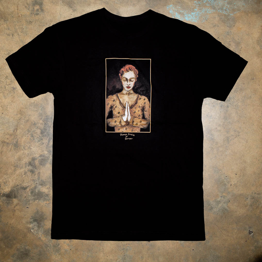 Please Evolve collaboration with artist Peter Barger. Please visit www.peterbarger.com to view his work and new children's book. 100% Black Cotton t-shirt. Graphic has a woman with praying hands.