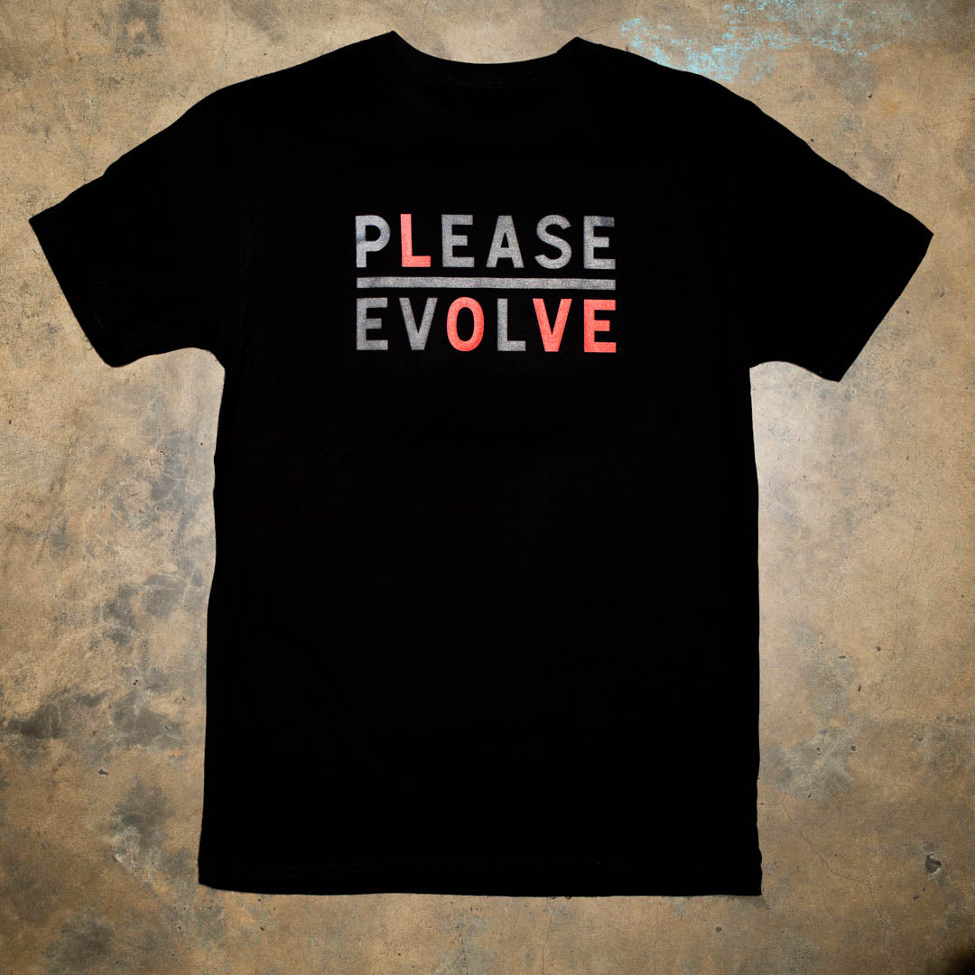 Please Evolve but with a twist. Please Love is a new version of our logo.  Black and Red colorway. 100% Black Cotton t shirt.  Look for the limited edition colorways to benefit nonprofits.