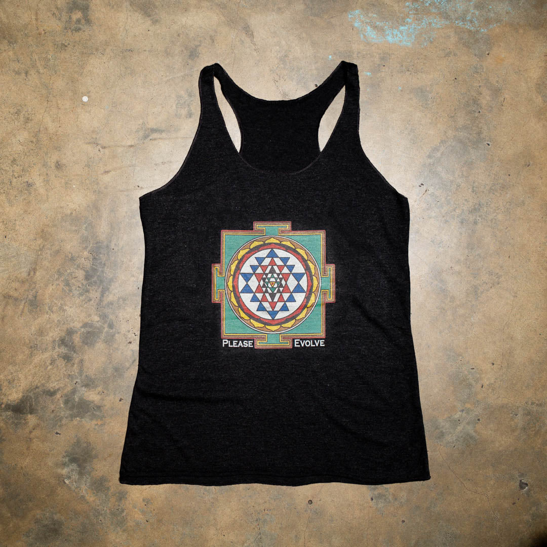 Do some yoga, meditate and chill before you hit the busy streets.  Keep the vibe alive with this classic and authentic mandala design.  Black tri blend racer back tank. Super Soft. Vintage mandala graphic with muted earth colors.