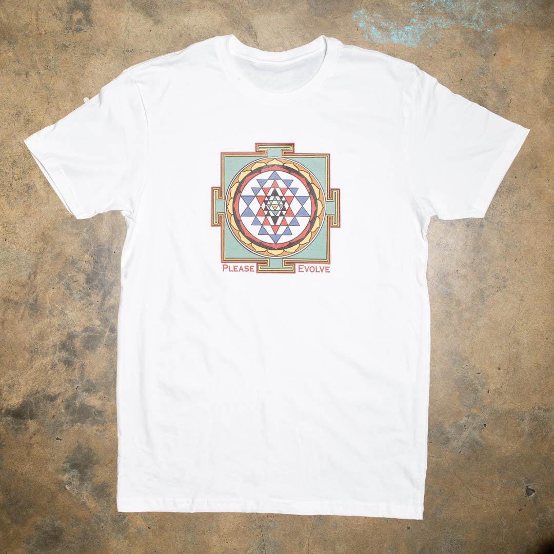 100% white cotton shirt with a vintage mandala graphic in muted earth colors