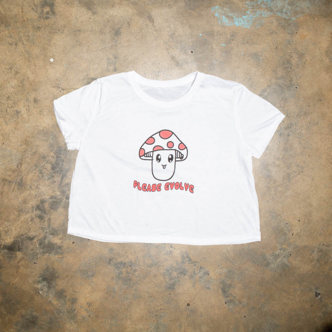 Project your happiness with this Happy Mushroom graphic. It works.  Super soft and comfy white tri blend crop. Black white and red mushroom graphic.